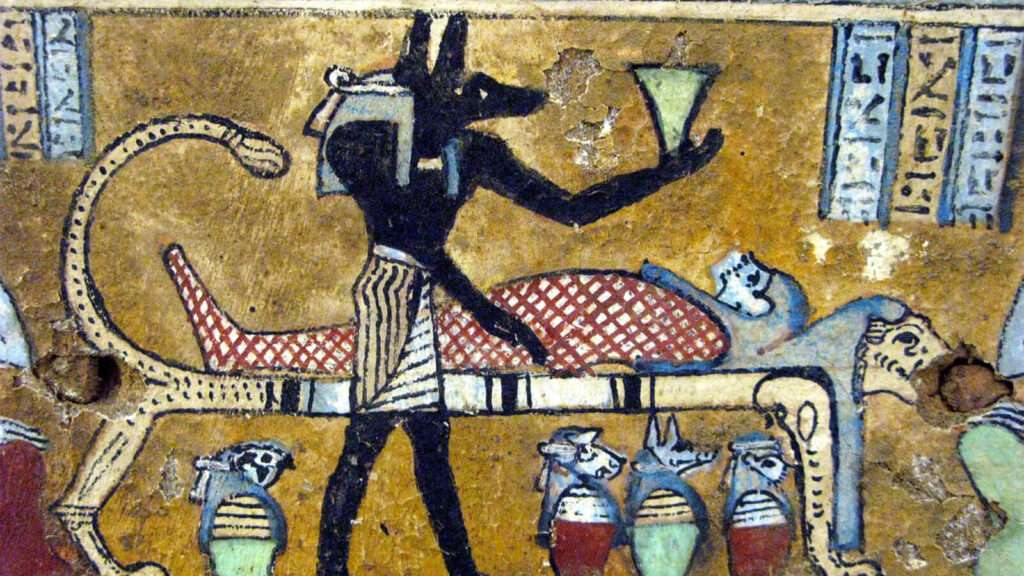 A classic depiction of Anubis as a man with a jackal head 