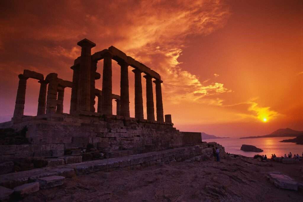 Photograph of the Temple of Poseidon at Sounion, during sunset.