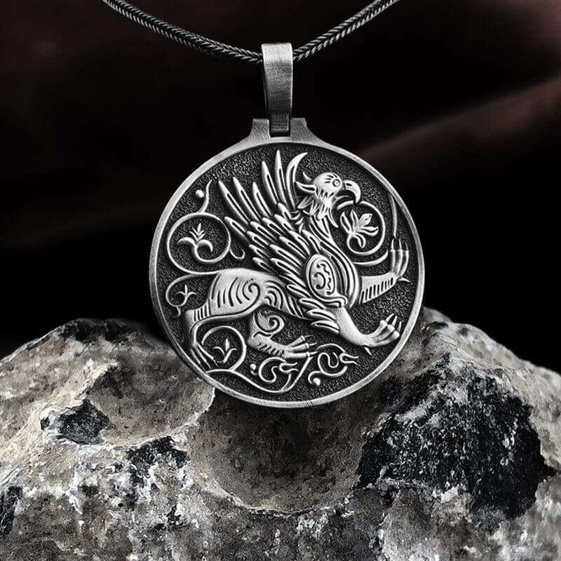 images of Griffin-themed jewelry and amulets from Egyptian antiquities.